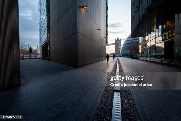 path to tower bridge and tower of london, sunrise, london, england - south bank london stock pictures, royalty-free photos & images
