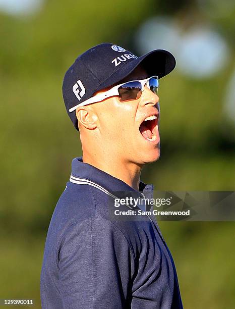 Ben Crane reacts to a missed birdie putt on the second playoff hole during the final round of the McGladrey Classic at Sea Island's Seaside Course on...