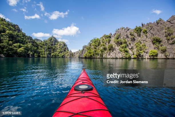 front end of a red kayak in the philippines. - manila philippines foto e immagini stock