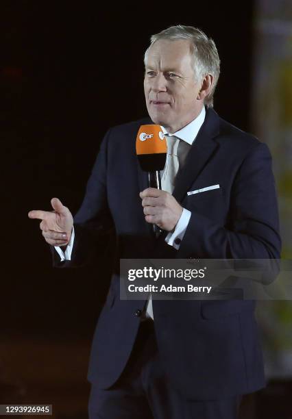Johannes B. Kerner moderates the "Willkommen 2021" performance behind the Brandenburg Gate on December 31, 2020 in Berlin, Germany. Due to the...