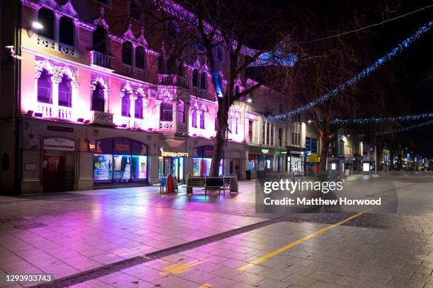 An empty St. Mary's Street in central Cardiff on December 31 in Cardiff, Wales. Wales went into a Level 4 lockdown from midnight on December 19. All...