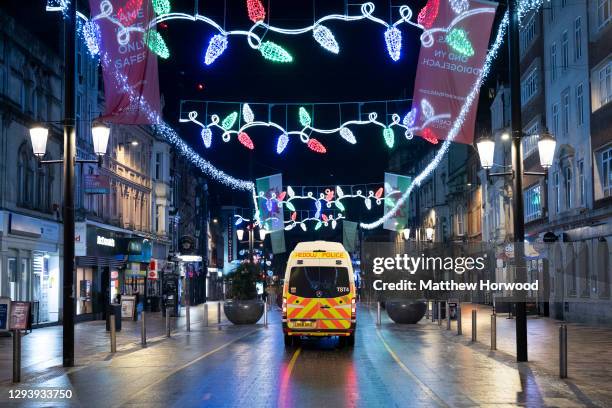 An empty St. Mary's Street in central Cardiff on December 31 in Cardiff, Wales. Wales went into a Level 4 lockdown from midnight on December 19. All...