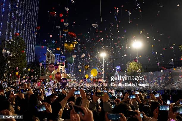 People release balloons into the air to celebrate the new year on January 1st, 2021 in Wuhan, Hubei Province,China.Wuhan With no recorded cases of...
