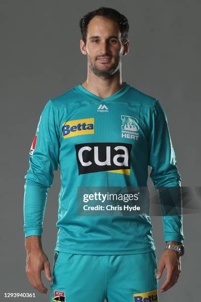 Lewis Gregory poses during the Brisbane Heat Big Bash League headshots session at the National Cricket Centre on December 31, 2020 in Brisbane,...