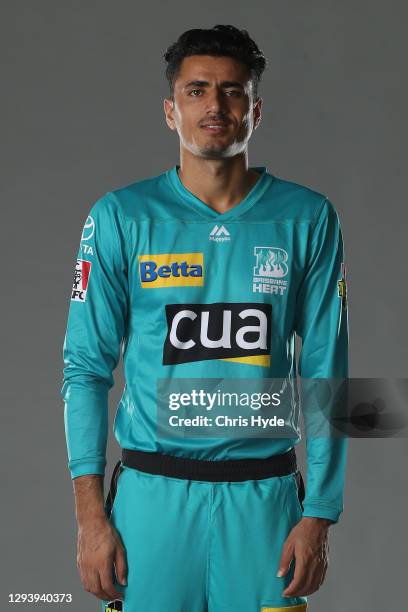 Mujeeb Ur Rahman poses during the Brisbane Heat Big Bash League headshots session at the National Cricket Centre on December 31, 2020 in Brisbane,...
