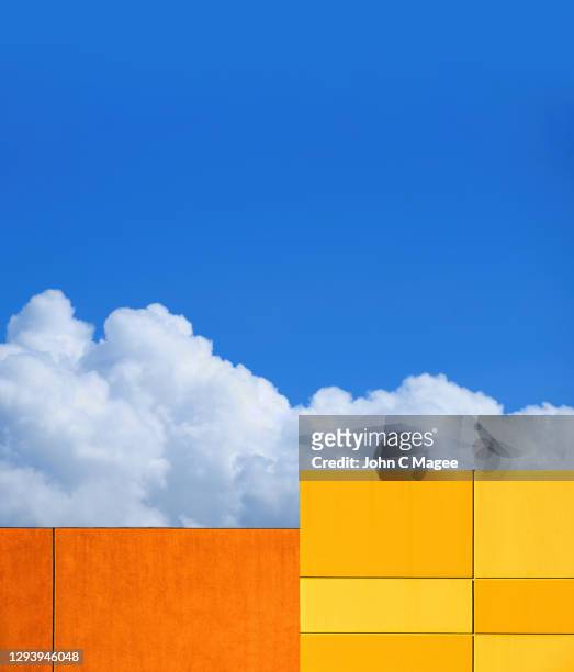 bright orange wall and clouds - portland neon sign stock pictures, royalty-free photos & images