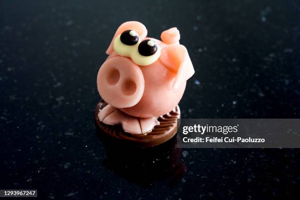 piggy cake with pink marzipan and chocolate - marzipan stock pictures, royalty-free photos & images