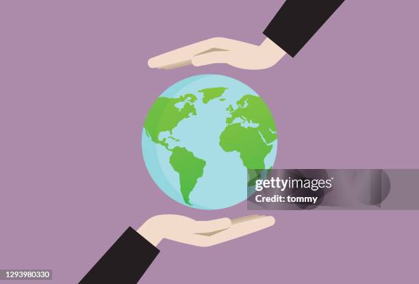 zwei hände, die ein erdsymbol halten - globe stock-grafiken, -clipart, -cartoons und -symbole