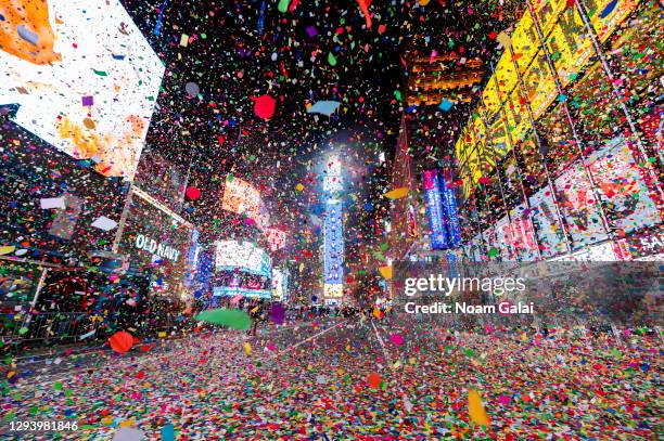 Times Square sits empty while fireworks and confetti are displayed at the 2021 New Year's Eve celebration in Times Square on December 31, 2020 in New...