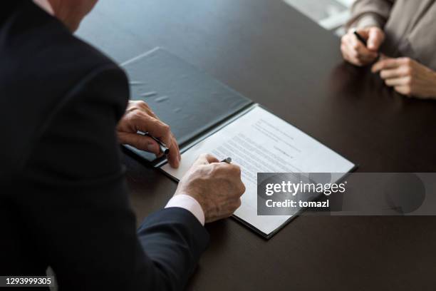 Signing Definition Agreement Signing Ceremony Photos and Premium High Res Pictures - Getty ...
