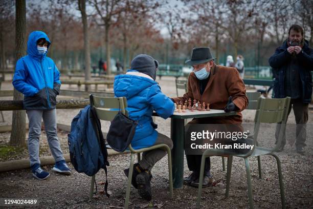 Parisians play chess at Luxembourg Gardens on New Years Day on January 01, 2021 in Paris, France. New Year's eve celebrations and fireworks were...