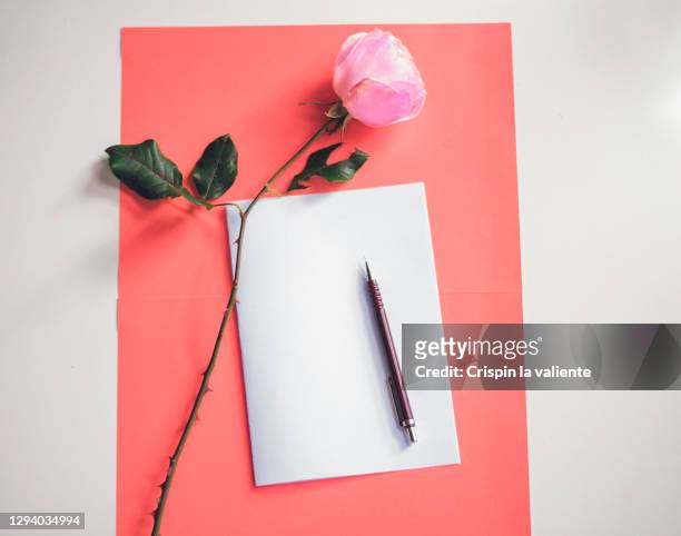 writing a love letter - love letter stock-fotos und bilder