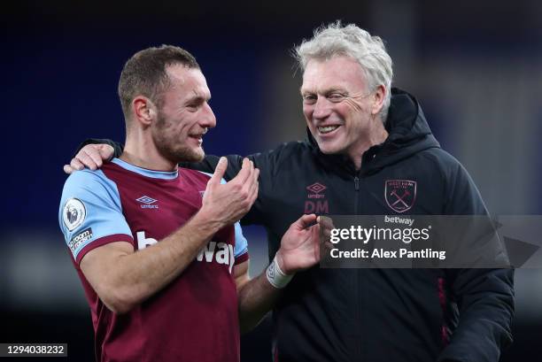 Vladimir Coufal of West Ham United and David Moyes, Manager of West Ham United react following victory during the Premier League match between...