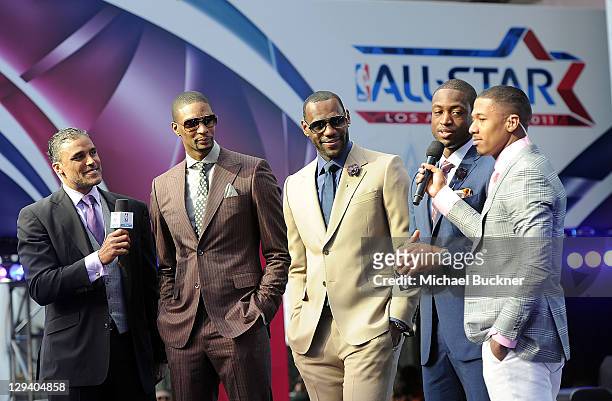Former NBA player Rick Fox, NBA players Chris Bosh, Dwyane Wade and LeBron James of the Miami Heat and singer Nick Cannon arrive at the T-Mobile...