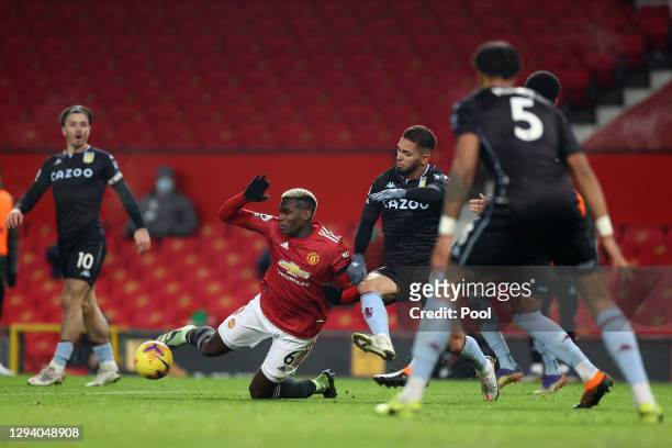Paul Pogba of Manchester United is fouled by Douglas Luiz of Aston Villa leading to a penalty during the Premier League match between Manchester...