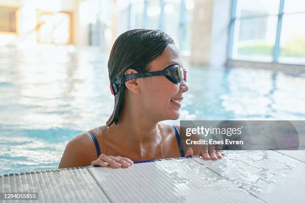 exercising indoor swimming pool - malay exercise indoor stock pictures, royalty-free photos & images
