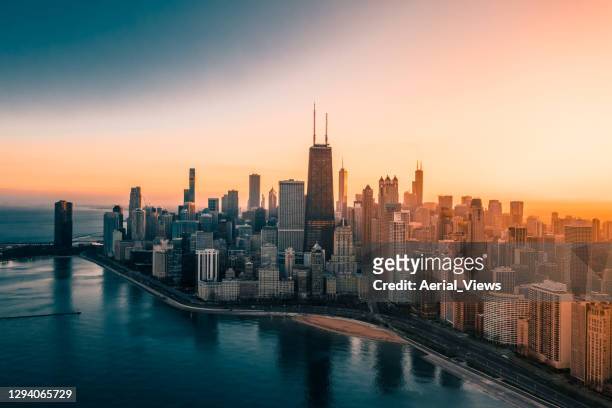 chicago skyline at sunset - aerial - chicago river stock pictures, royalty-free photos & images