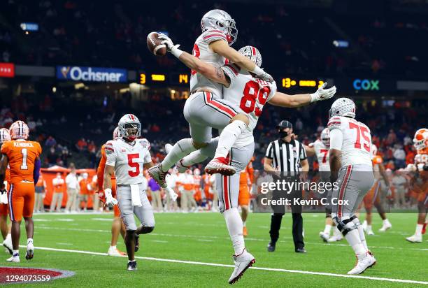 Luke Farrell and Jeremy Ruckert of the Ohio State Buckeyes celebrate a touchdown against the Clemson Tigers in the first quarter during the College...