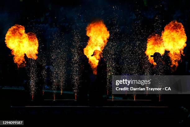 Hobart Hurricanes players run out to field in the second innings during the Big Bash League match between the Hobart Hurricanes and the Melbourne...