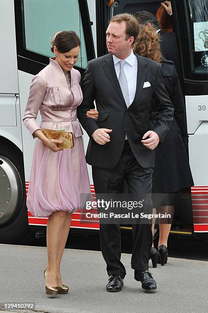 Prince Gustav of Sayn-Wittgenstein-Berleburg and Carina Axelsson arrive to attend the christening of Crown Prince Frederik and Crown Princess Mary's...