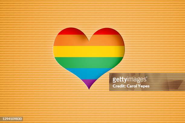 lgtb pride in heart shape - rainbow confetti stock pictures, royalty-free photos & images