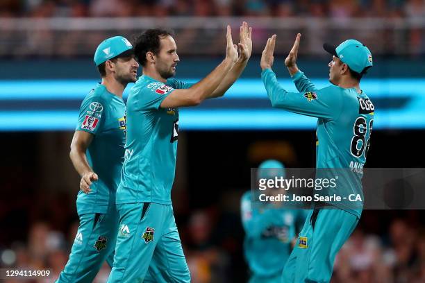 Lewis Gregory of the Heat celebrates a wicket during the Big Bash League match between the Brisbane Heat and the Sydney Sixers at The Gabba, on...