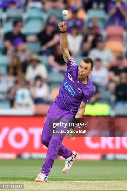 Johan Botha of the Hurricanes bowls during the Big Bash League match between the Hobart Hurricanes and the Melbourne Stars at Blundstone Arena, on...