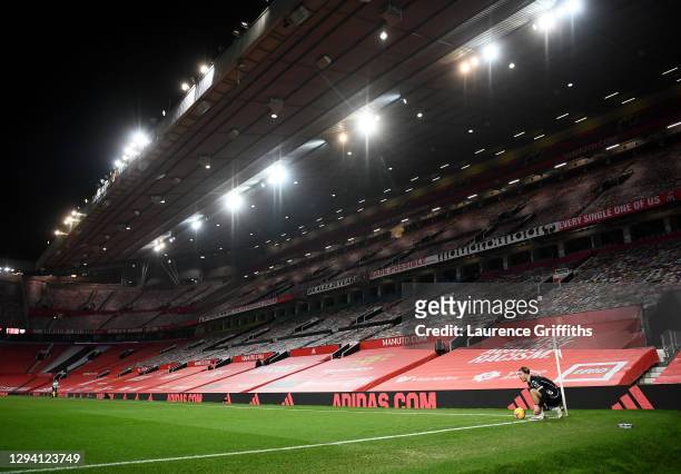 Jack Grealish of Aston Villa prepares to take a corner kick in from of the empty Sir Alex Ferguson stand during the Premier League match between...