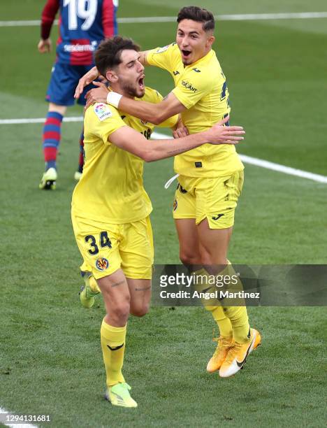 Fernando Nino of Villarreal celebrates with teammate Yeremi Pino after scoring their team's first goal during the La Liga Santander match between...