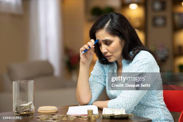 young woman - stock photo - indian economy stock pictures, royalty-free photos & images