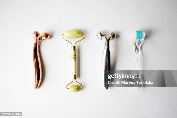 many different face massagers. - massager stock pictures, royalty-free photos & images