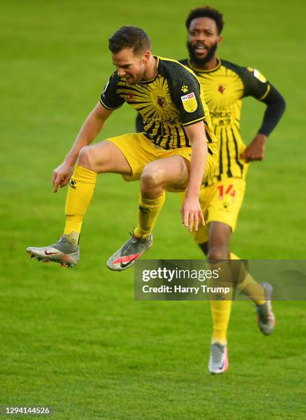 Tom Cleverley of Watford celebrates with teammate Nathaniel Chalobah after scoring their team's first goal during the Sky Bet Championship match...