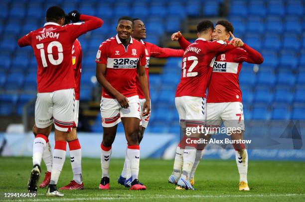 Marcus Tavernier of Middlesbrough celebrates with teammate Marcus Browne after scoring their team's second goal during the Sky Bet Championship match...