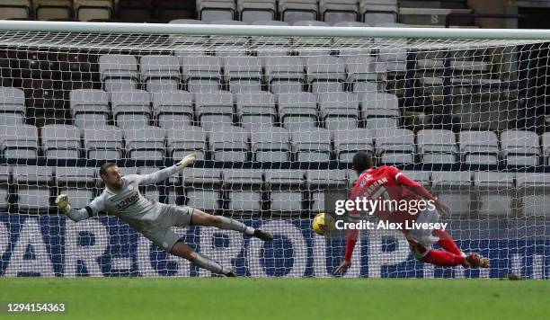 Lewis Grabban of Nottingham Forest scores from the penalty spot for his team's first goal during the Sky Bet Championship match between Preston North...