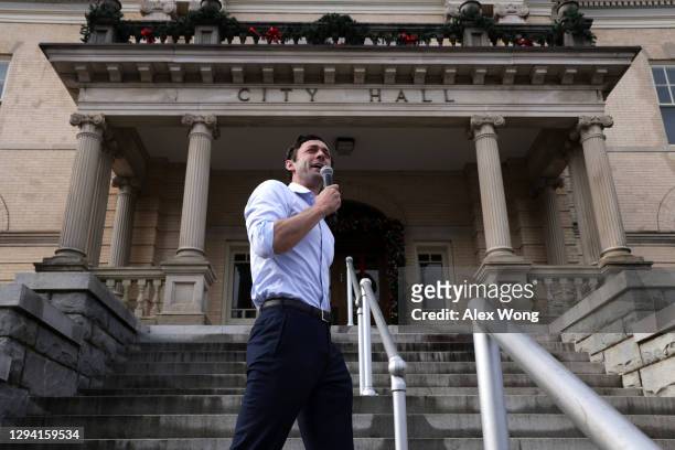 Democratic U.S. Senate candidate Jon Ossoff speaks during a campaign stop outside Athens-Clarke County City Hall January 2, 2021 in Athens, Georgia....