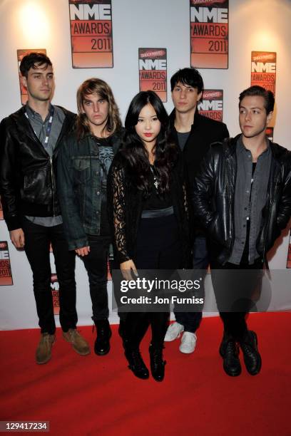 David Beadle, Thom Powers, Aaron Short, Jesse Wood and Alisa Xayalith of Naked and Famous arrive for the NME Awards 2011 at Brixton Academy on...