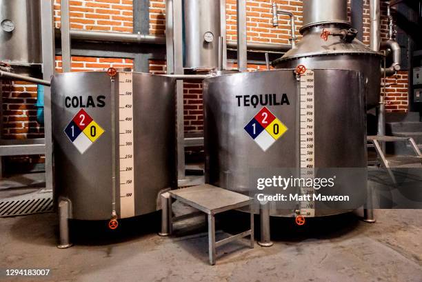 distilling the juice of blue agave fermentation room in la cofradia factory in tequila in jalisco state mexico - cofradia stock pictures, royalty-free photos & images