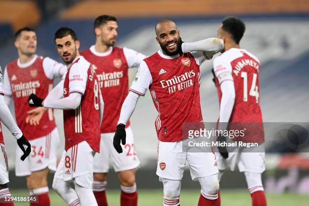 Alexandre Lacazette of Arsenal celebrates after scoring their team's third goal during the Premier League match between West Bromwich Albion and...