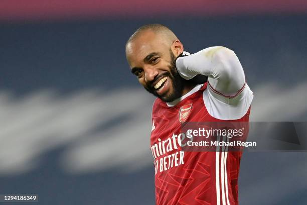 Alexandre Lacazette of Arsenal celebrates after scoring their team's fourth goal during the Premier League match between West Bromwich Albion and...