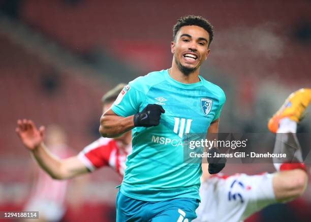 Junior Stanislas of Bournemouth celebrates after scoring the opening goal during the Sky Bet Championship match between Stoke City and AFC...