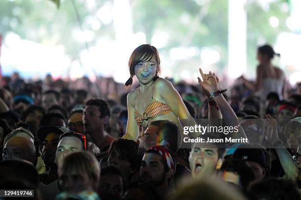 Fans dance as Miike Snow performs onstage during Bonnaroo 2010 at This Tent on June 10, 2010 in Manchester, Tennessee.