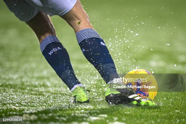 West Brom player clears the ball during the Premier League match between West Bromwich Albion and Arsenal at The Hawthorns on January 02, 2021 in...