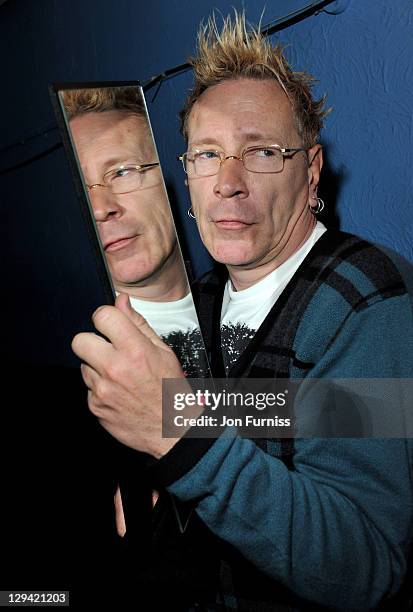 John Lydon poses with the award for 'Best Book' during the NME Awards 2011 at Brixton Academy on February 23, 2011 in London, England.