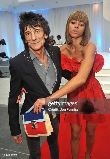 Ronnie Wood and Ana Araujo attends the UK premiere of 'Larry Crowne' at Vue Westfield on June 6, 2011 in London, England.