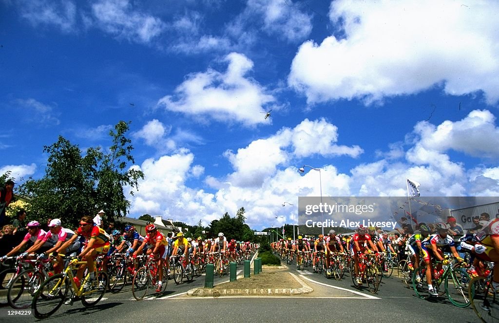 The peleton is split by the central reservation as the helicopter watches from above