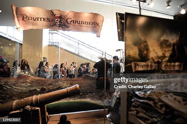 General view of atmosphere is seen as cast members Astrid Berges-Frisbey and Sam Claflin were on hand Saturday, April 30, at the Hot Topic flagship...