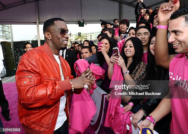 Recording artist Sean 'P. Diddy' Combs arrives at the T-Mobile Magenta Carpet at the 2011 NBA All-Star Game at L.A. Live on February 20, 2011 in Los...