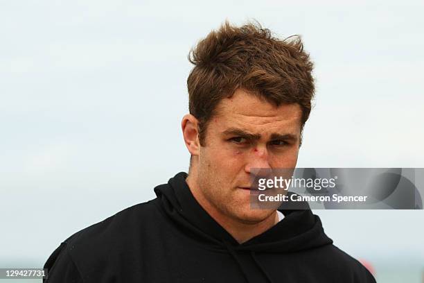 Wallabies captain James Horwill looks on during an Australia IRB Rugby World Cup 2011 recovery session at Takapuna Beach on October 17, 2011 in...