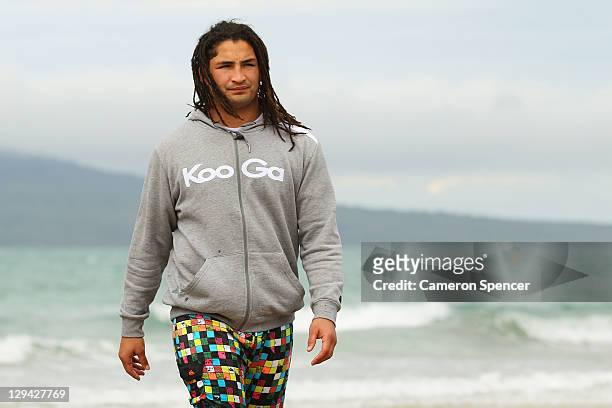 Saia Fainga'a of the Wallabies looks on during an Australia IRB Rugby World Cup 2011 recovery session at Takapuna Beach on October 17, 2011 in...