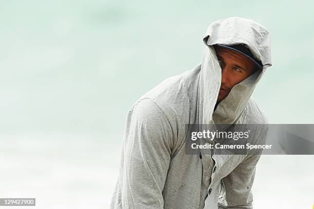 Quade Cooper of the Wallabies looks on during an Australia IRB Rugby World Cup 2011 recovery session at Takapuna Beach on October 17, 2011 in...